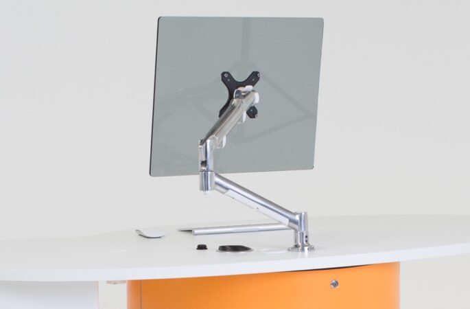 ATDEC Premium Articulated Monitor Arm installed on YAKETY YAK Oval + Drawer 104 desk.