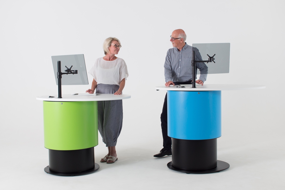 Height adjustable YAKETY YAK 102 pod allows staff to work ergonomically at seated or standing height.