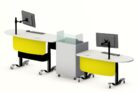 YAKETY YAK 405 Desk (seated position), teamed with YAKETY YAK 406 Desk (standing position) and our Cash/Credit Module in the center, form a dynamic circulation area.