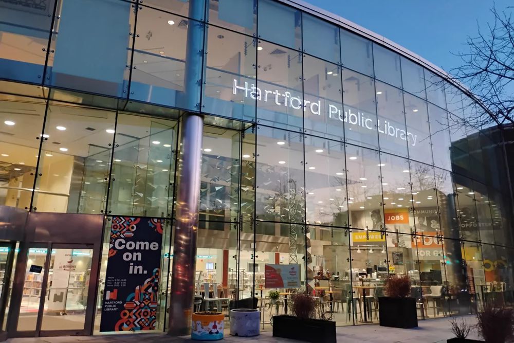 The modern and welcoming exterior of the Downtown Library of Hartford Public Library.