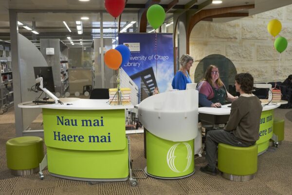 A grouping of a YAKETY YAK 202 Desk, Work Module and 203 Desk welcomes students to the Central Library.