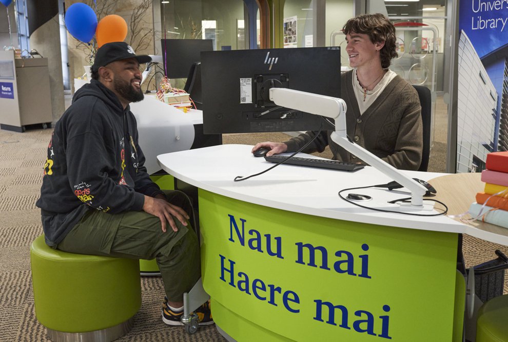 A YAKETY YAK 203 Desk lowered to seated position allows for comfortable interaction.