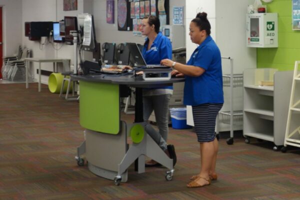 YAKETY YAK 209 Desk with a cantilevered meeting end on both sides, allows two staff members to work together, at Karama Library.
