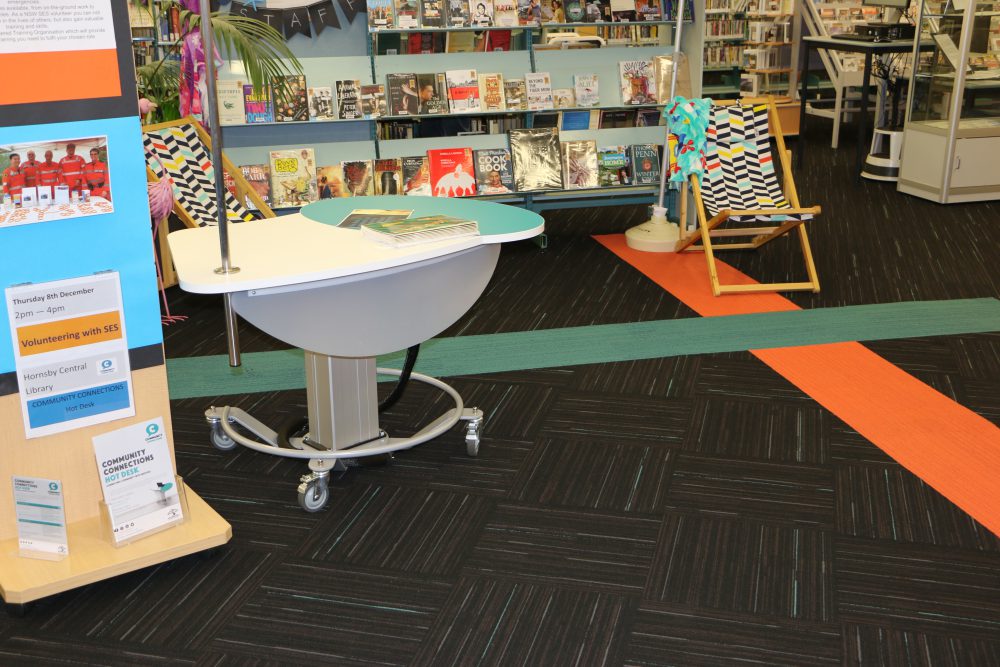 Yakety Yak 201 desk provides a focal point for a summer themed pop-up at Hornsby Central Library.