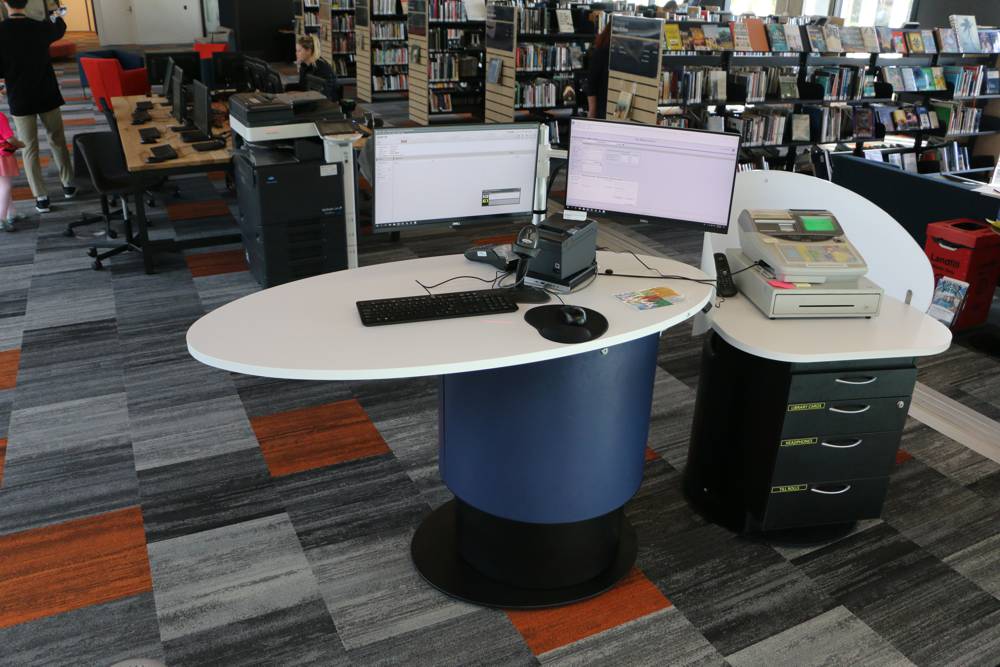 YAKETY YAK Oval 103 library pod and YAKETY YAK Cash Module, take care of customer help in the heart of the library.