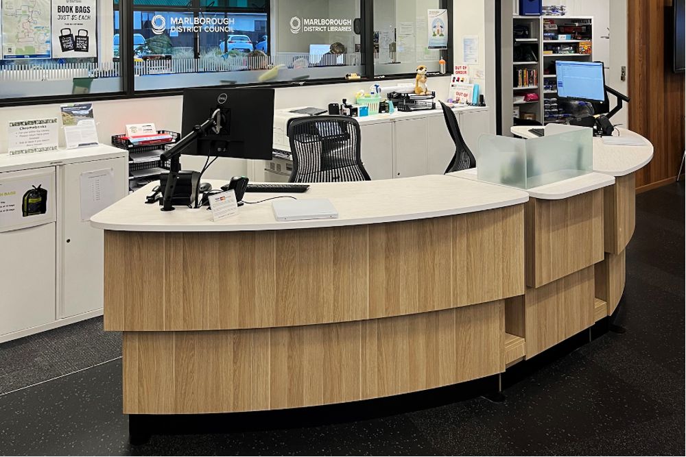 Two YAKETY YAK 305 Radial Counters flank a 300 Cash Module to form the main circulation desk at Picton Library.