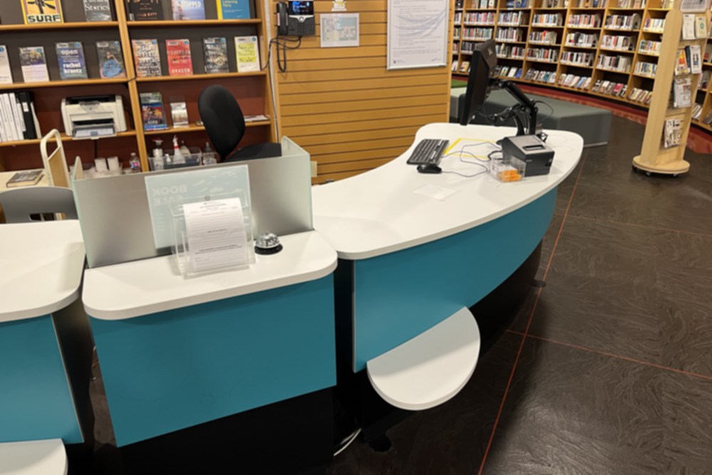 YAKETY YAK 305 Counter comes with a handy bag shelf, at Richmond Public Library.