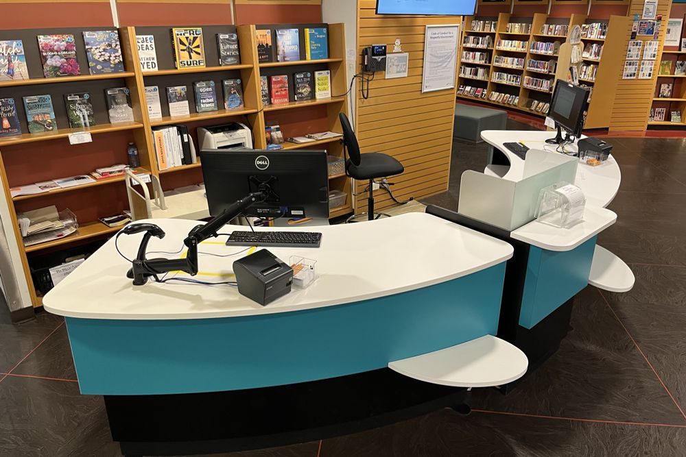 YAKETY YAK 305 Radial Counters form an inviting customer service setting, at Richmond Public Library.