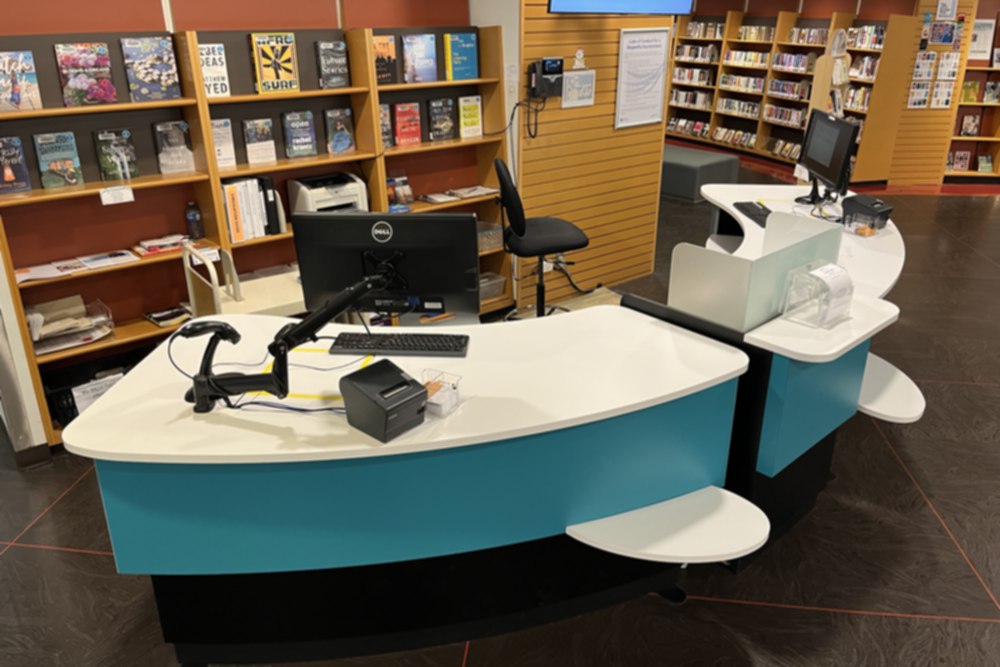 YAKETY YAK 305 Radial Counters form an inviting customer service setting, at Richmond Public Library, CA.