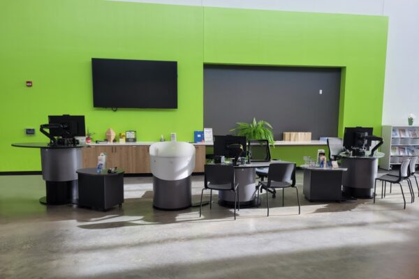 Sleek, dark Pods and support modules allow the bold lime green feature wall to ‘Pop’.