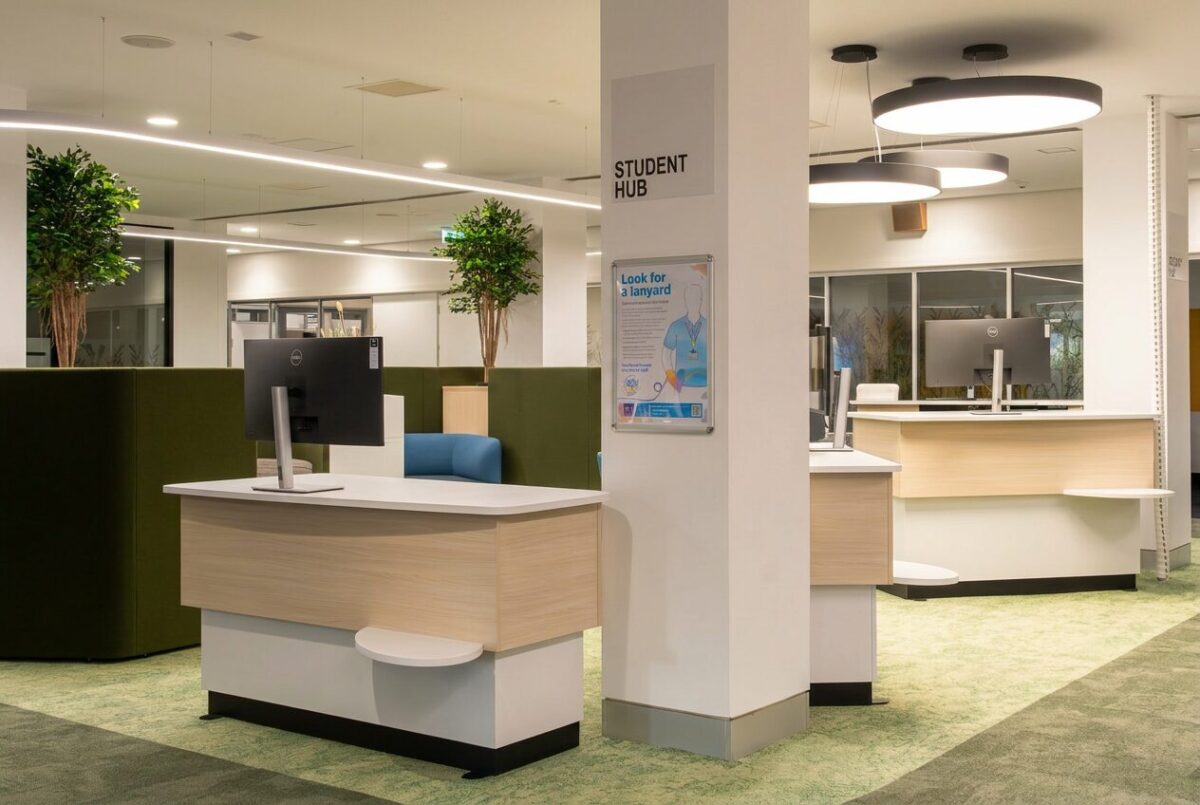 A group of four YAKETY YAK 303 Counters arranged as help desks at the new Student Hub, University of Newcastle.