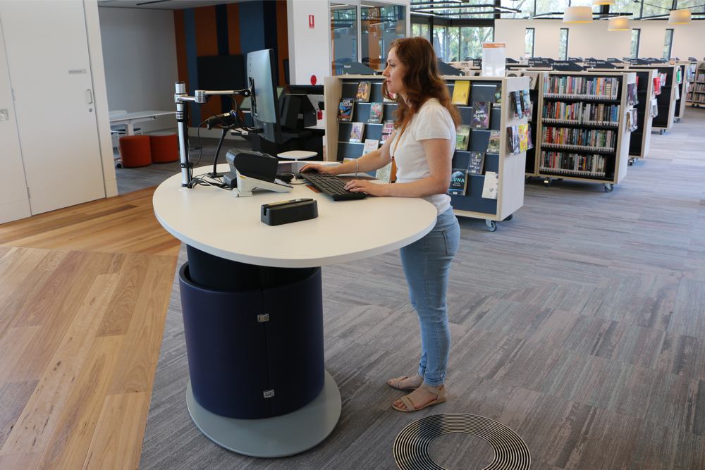 YAKETY YAK Classic Oval 1600 Pod, customised with a wider worktop to house a cash tray, at Warilla Library front of house.